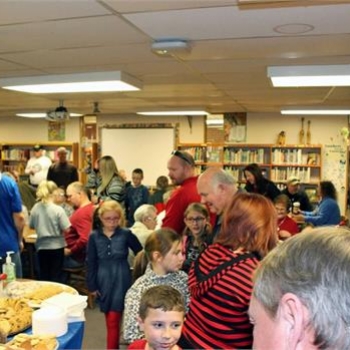 Veterans and essay winners share refreshments